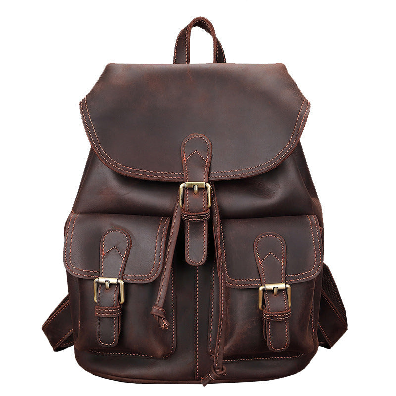 Stylish and versatile men's leather travel backpack from Bags, Shoes & More. Features a spacious main compartment, dual front pockets, and adjustable straps for comfortable carry.