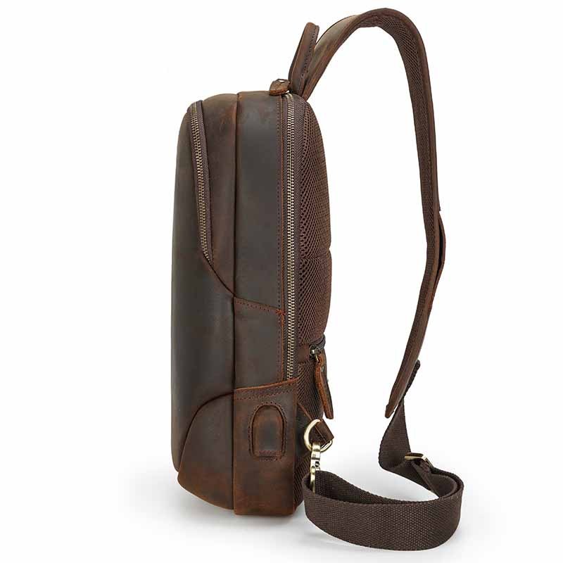 Vintage Casual Leather Men's Chest Bag by Bags, Shoes & More. The leather backpack features a zipper closure, adjustable shoulder strap, and multiple compartments for storage and organization.