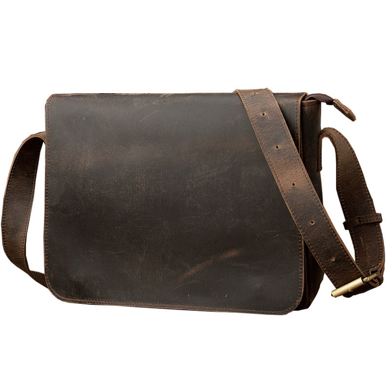 Rugged Leather Shoulder Bag: A stylish and durable leather messenger bag with an adjustable shoulder strap, perfect for casual everyday use or professional settings.